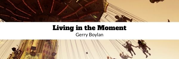 Midway ride, black text, Living in the Moment, Gerry Boylan
